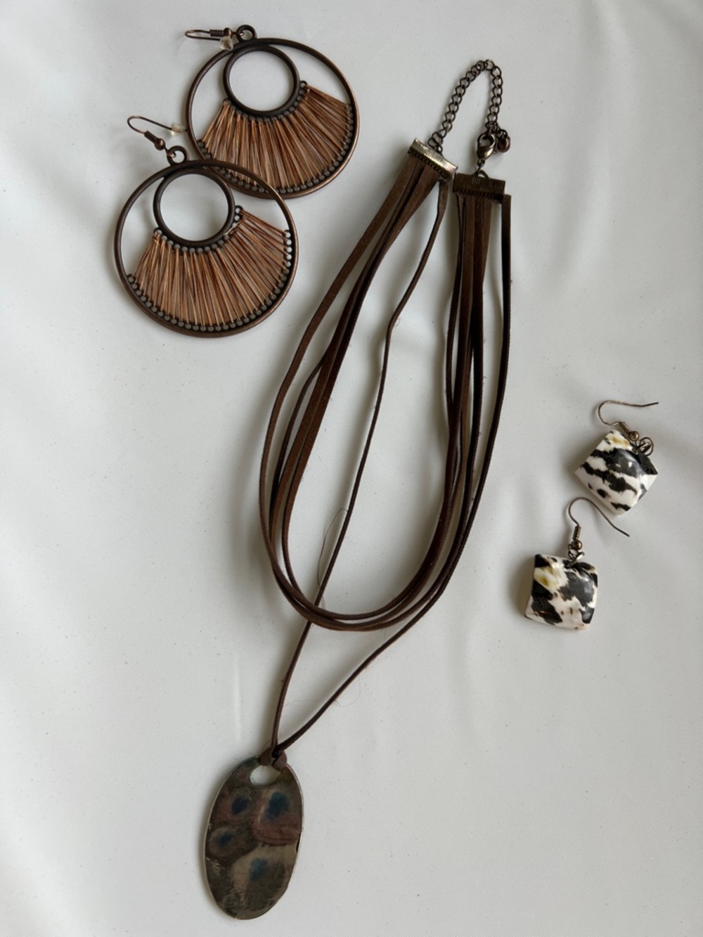 Boho Multi-Strand Brown Leather Necklace with Oval Pendant and earrings